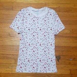 Size Medium White high collar shirt with a flower pattern